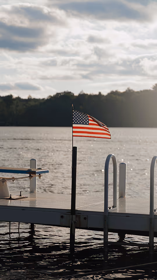 Staff member with students at summer program